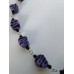 Ketting zebrakralen zwart / paars